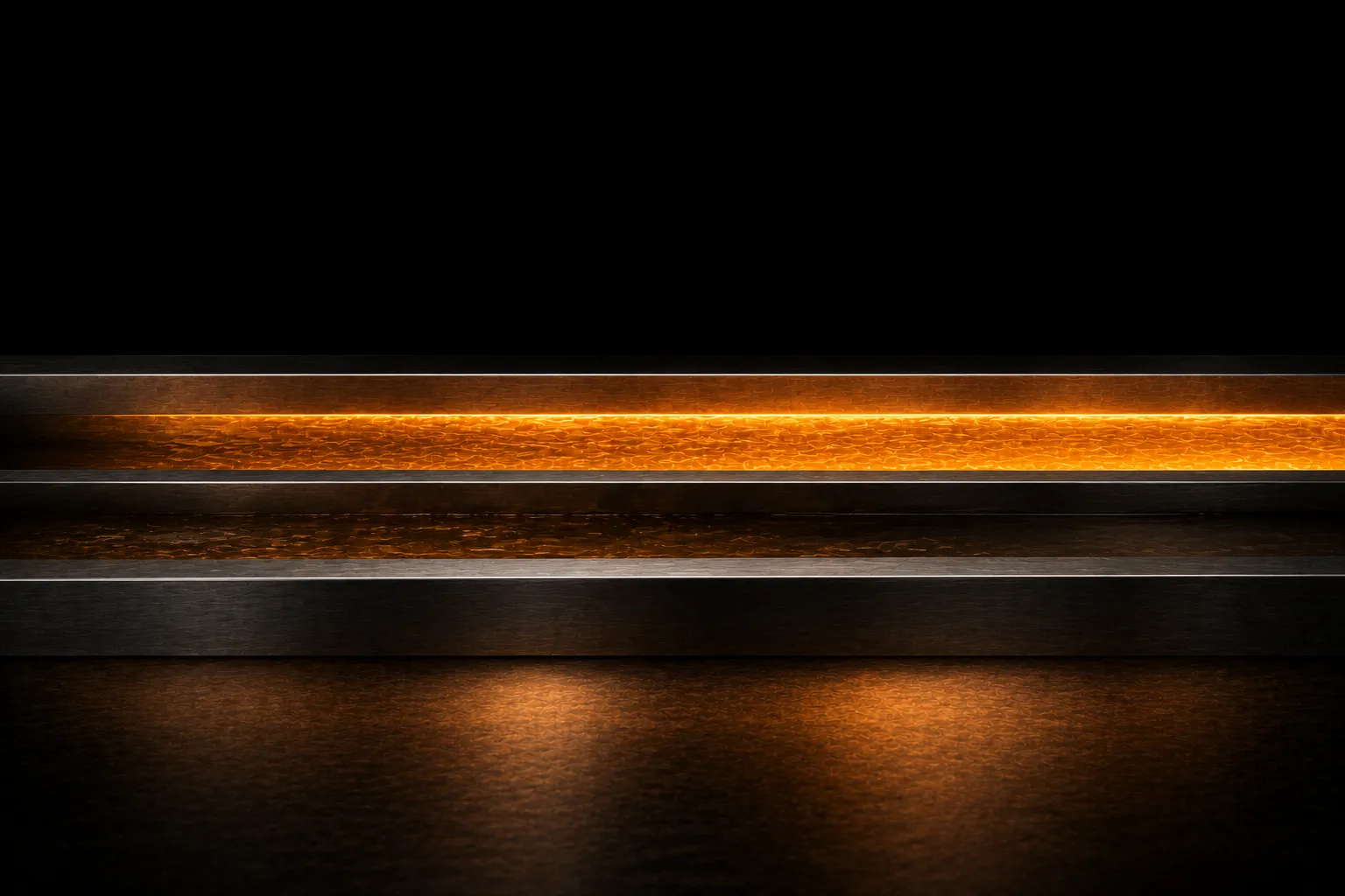 A steel channel divided lengthwise, one side running full and bright with glowing liquid, the other only a dull trickle.