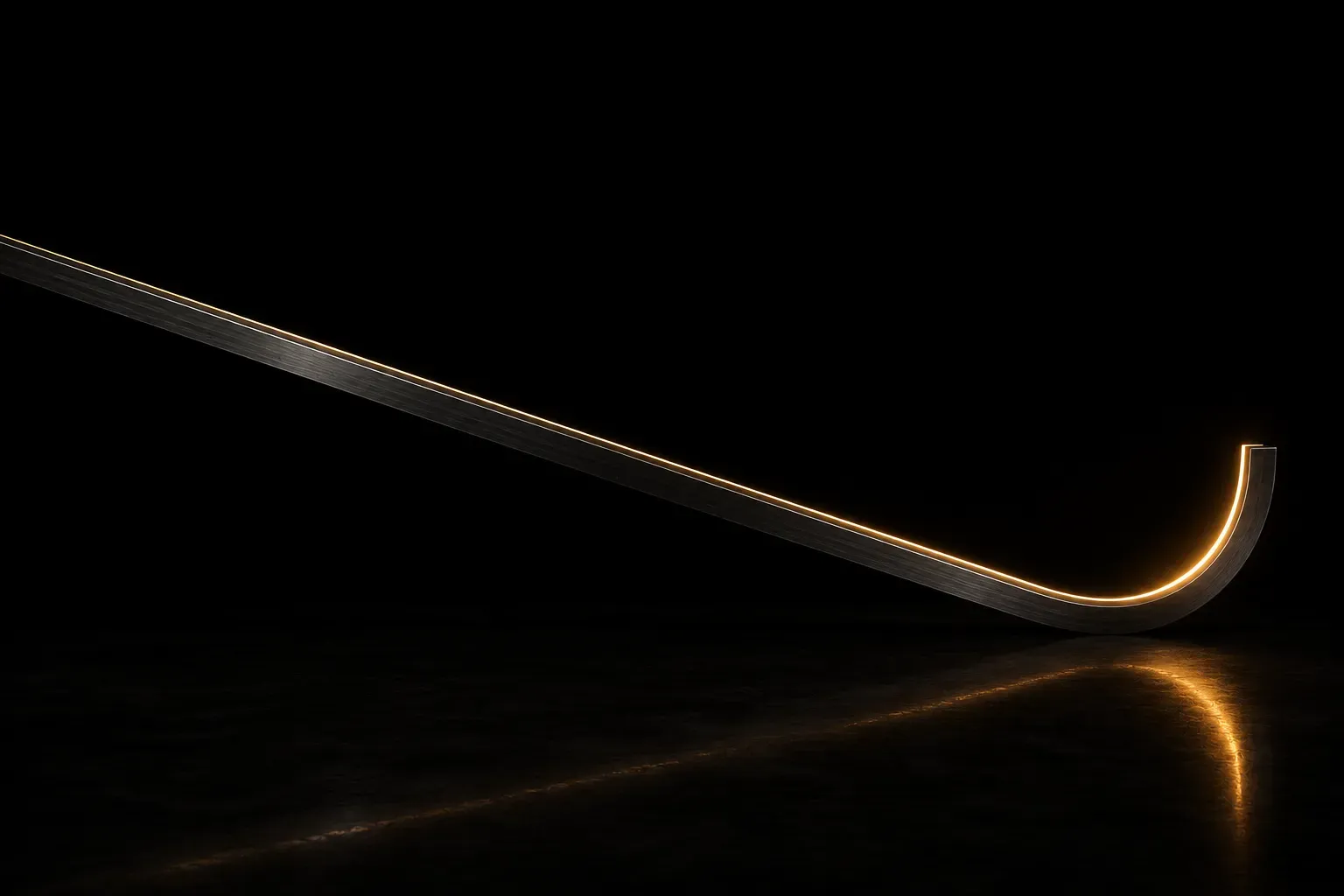 A long steel rail descending across darkness and curving upward at its far end, a thin line of warm light running along the curve.